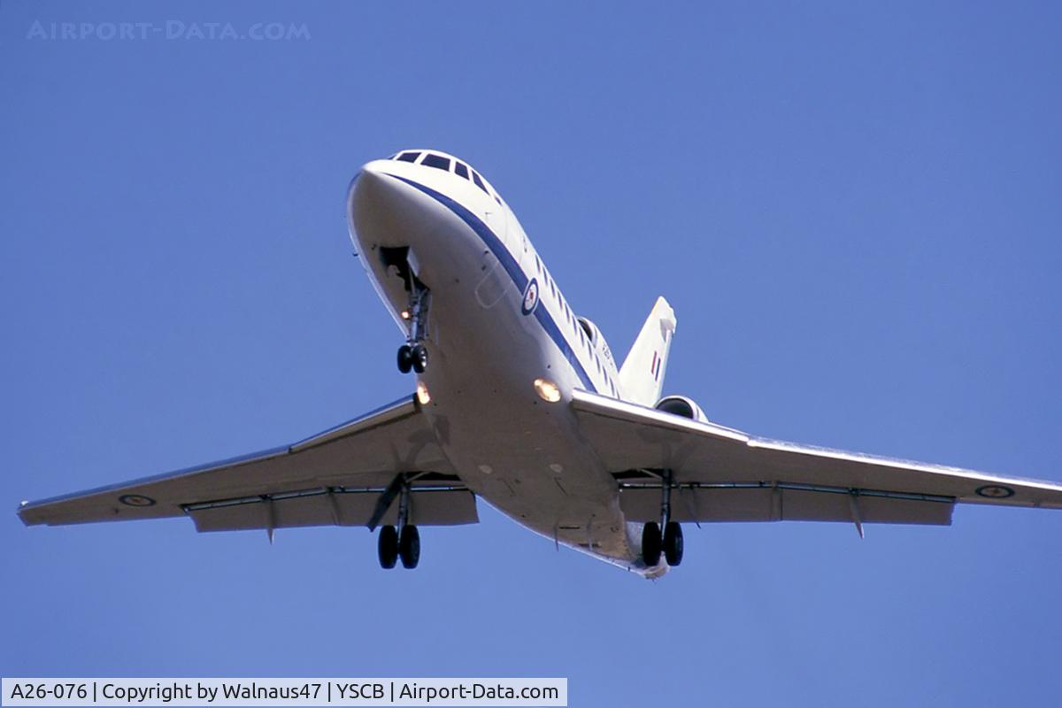 A26-076, 1989 Dassault Falcon 900 C/N 076, Cropped front Port side view of RAAF 34 Squadron VIP Falcon 900 A26-076 Cn 076 on final approach to Canberra's Rwy 35 during mid 1999. This was one of five F900s then being operated as 'Special Purpose Aircraft' by 34 Squadron.
