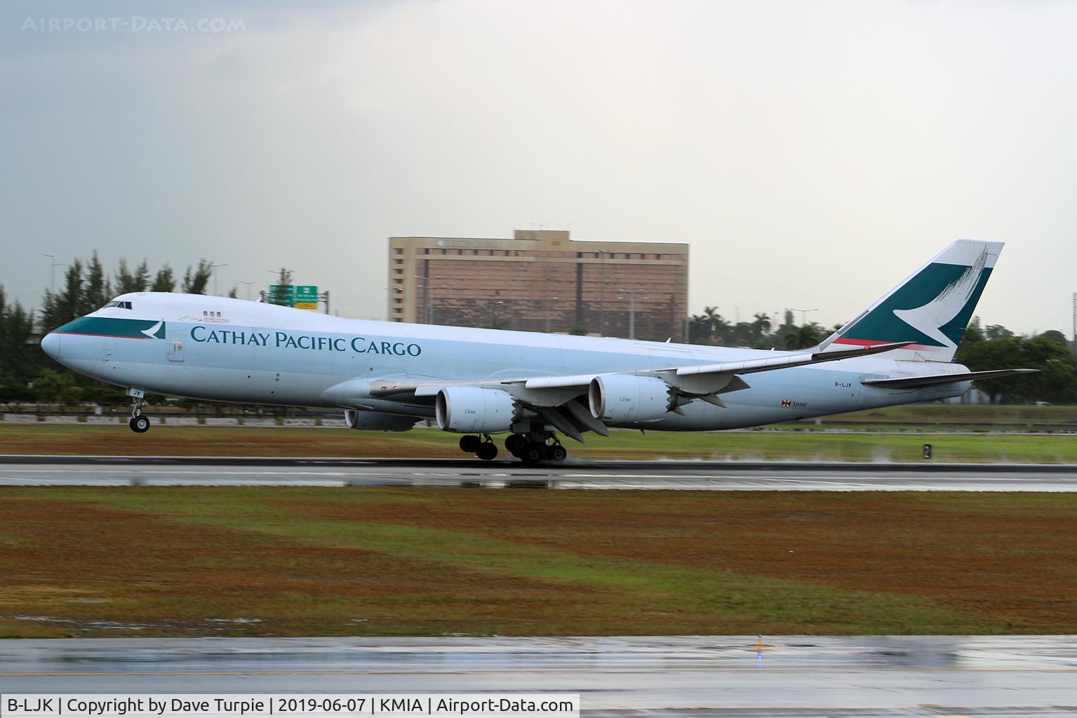 B-LJK, 2013 Boeing 747-867F/SCD C/N 43394, Landing in the liquid sunshine.