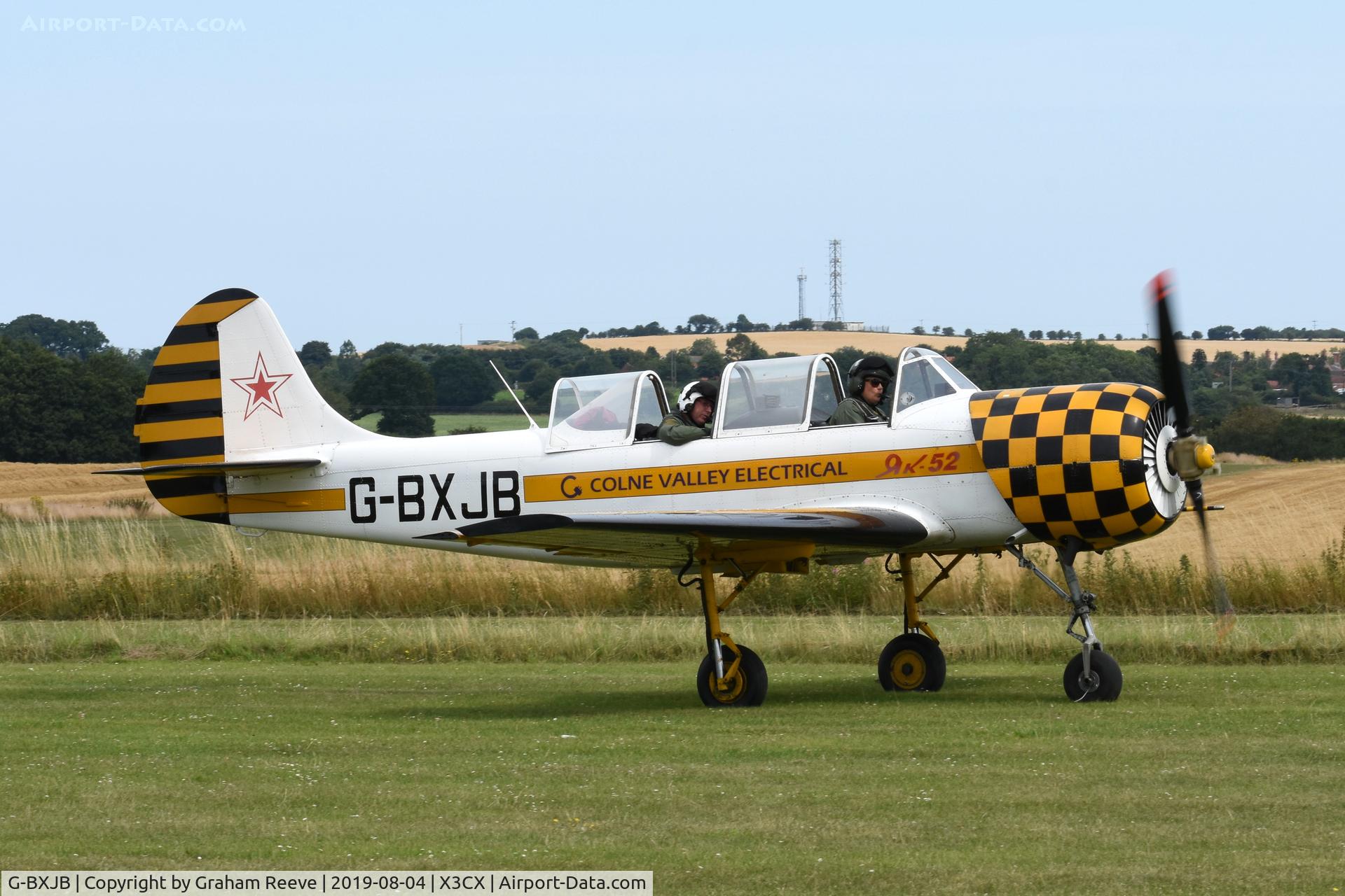 G-BXJB, 1987 Bacau Yak-52 C/N 877403, Just landed at Northrepps.