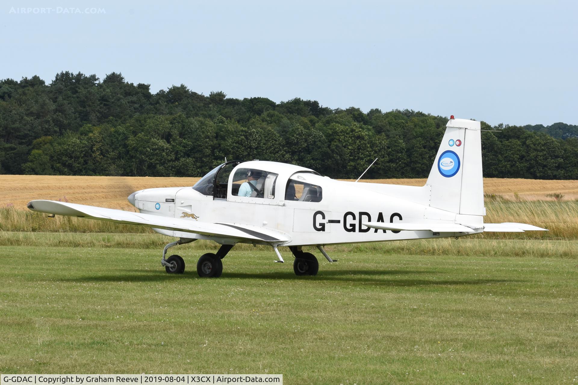 G-GDAC, 1976 Grumman American AA-5A Cheetah C/N AA5A-0347, Departing from Northrepps.