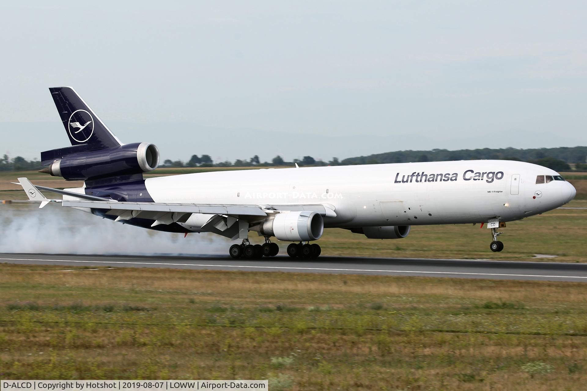D-ALCD, 1998 McDonnell Douglas MD-11F C/N 48784, Smokey touchdown on runway 34
