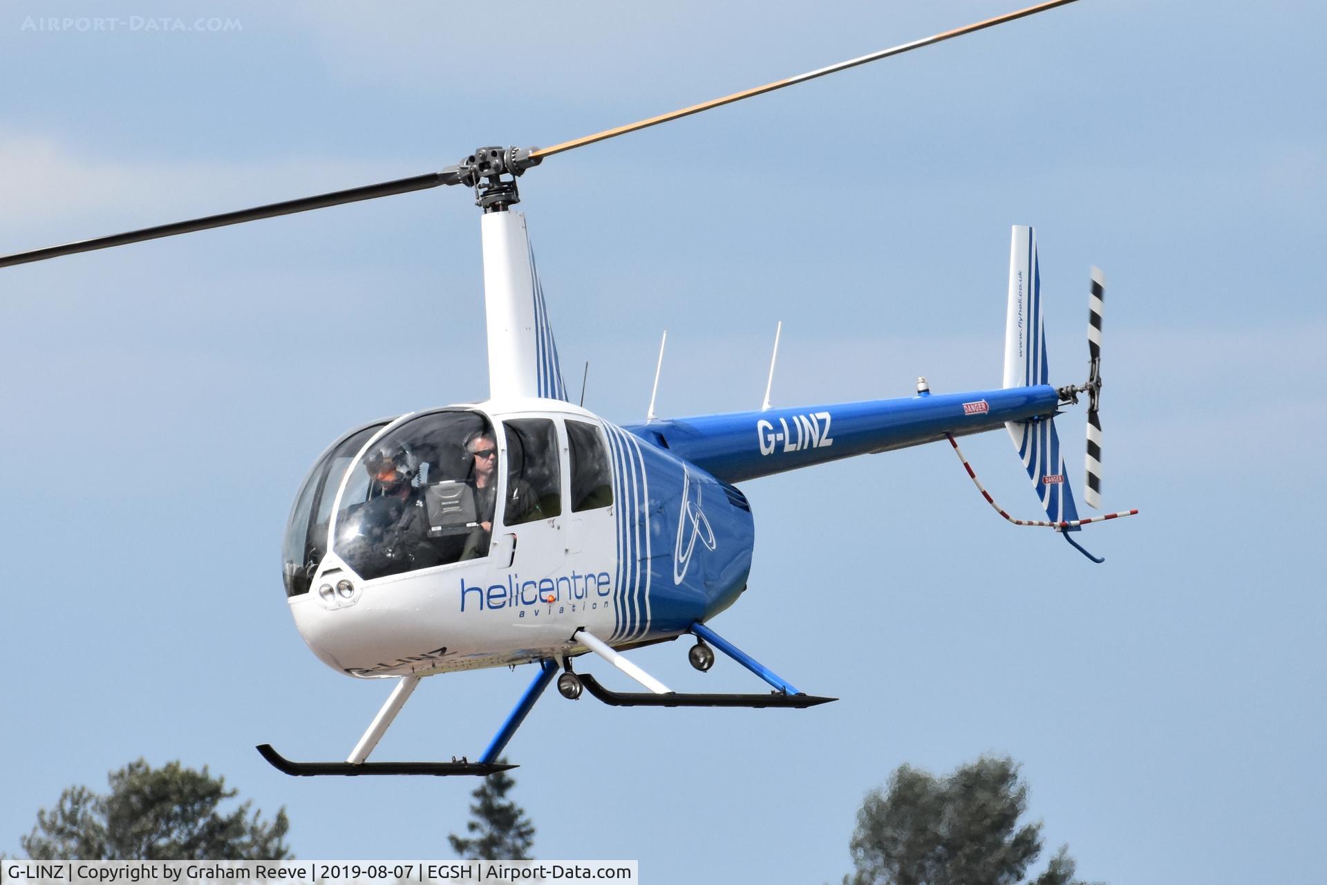 G-LINZ, 2007 Robinson R44 Raven II C/N 11911, Landing at Norwich.