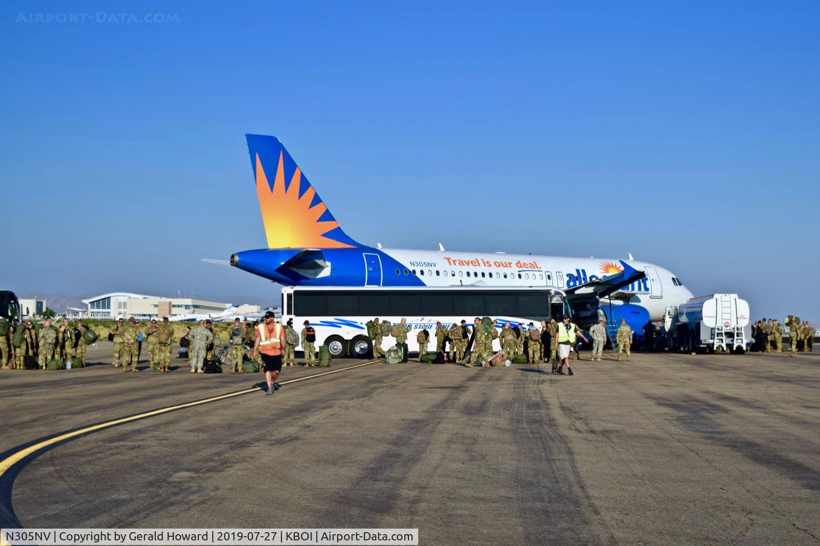 N305NV, 2005 Airbus A319-111 C/N 2398, Charter flight bringing back the troops from active duty.