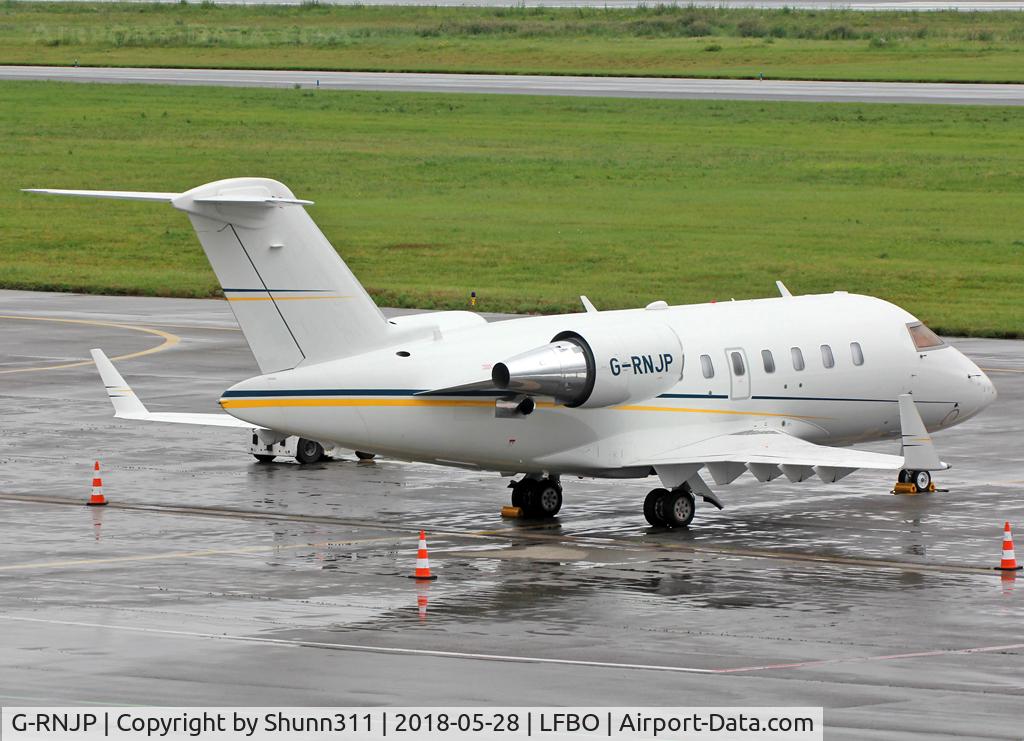 G-RNJP, 2015 Bombardier Challenger 604 (CL-600-2B16) C/N 5980, Parked at the General Aviation area...