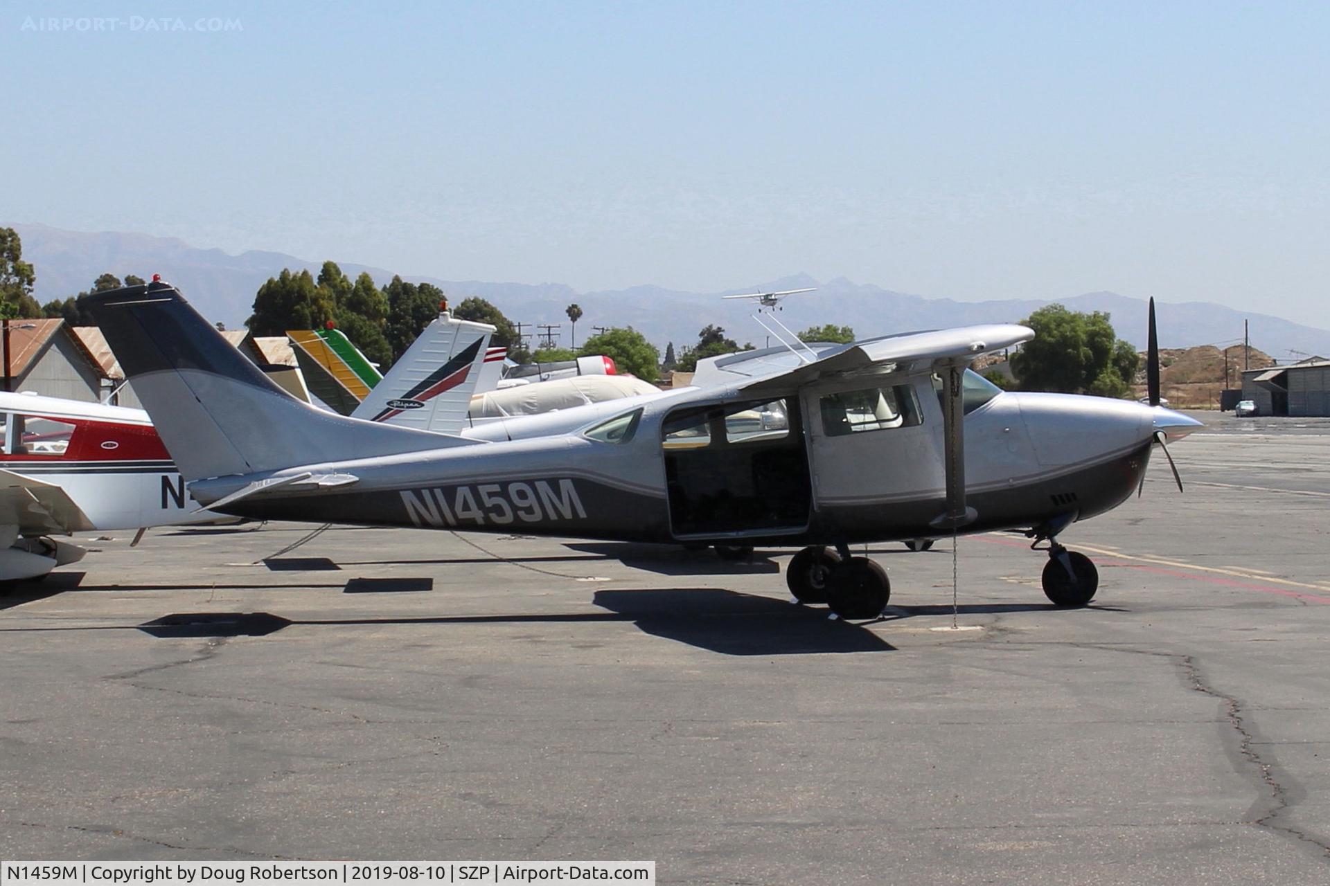 N1459M, 1969 Cessna U206E Skywagon C/N U20601459, 1969 Cessna U206E SKYWAGON, Continental IO-520 285 Hp, modified by STC for parachute jumps, roller blind door open. On Transient Ramp. See more photos of returning visitor going back to 2005...