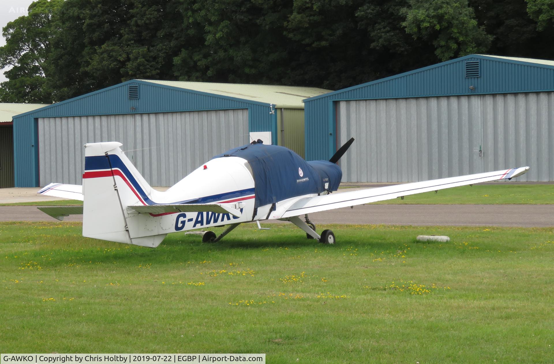 G-AWKO, 1968 Beagle B-121 Pup Series 1 (Pup 100) C/N B121-019, Parked and covered at Kemble