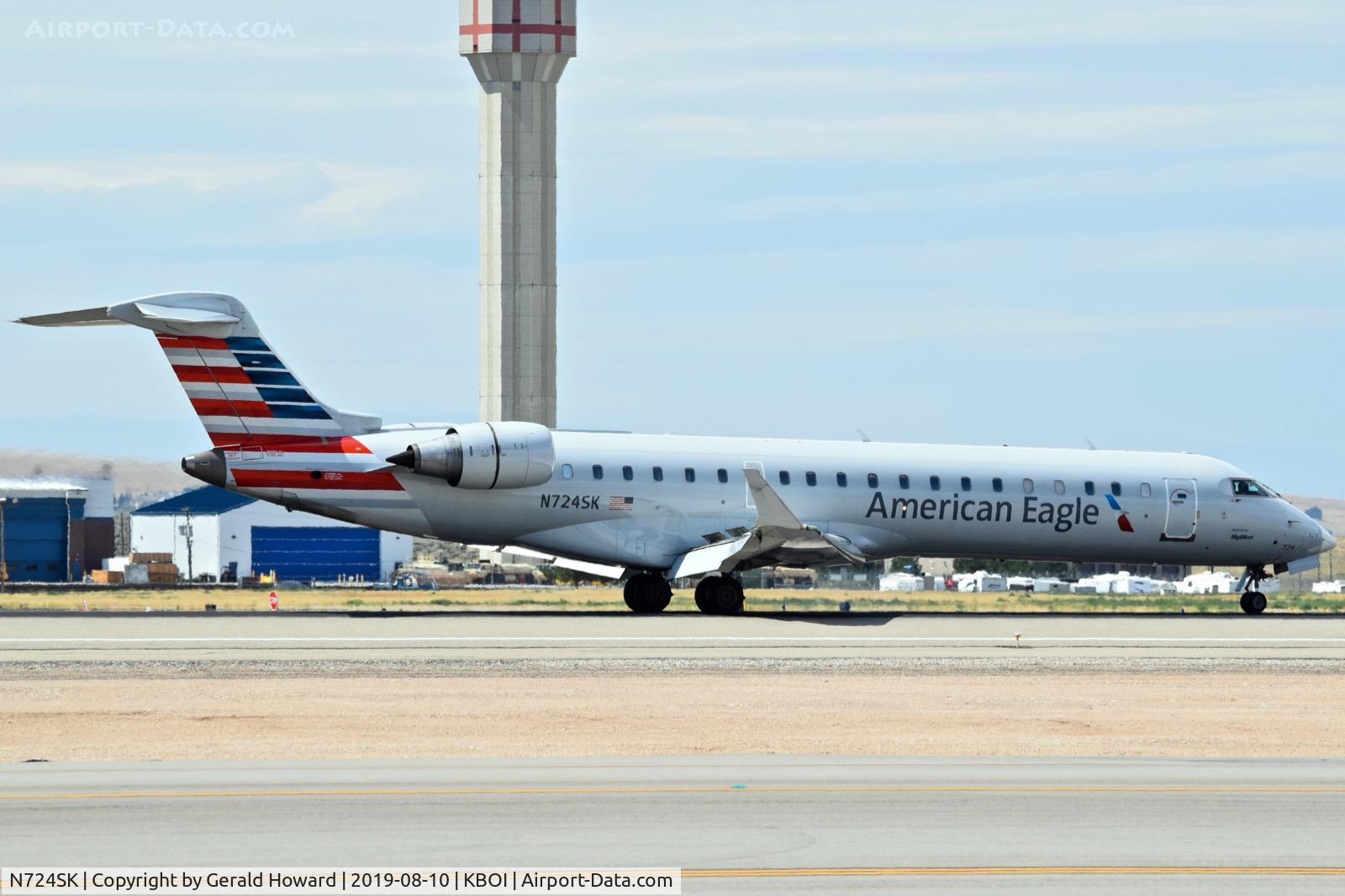 N724SK, 2004 Bombardier CRJ-700 (CL-600-2C10) Regional Jet C/N 10189, Landing roll out on RWY 28R.