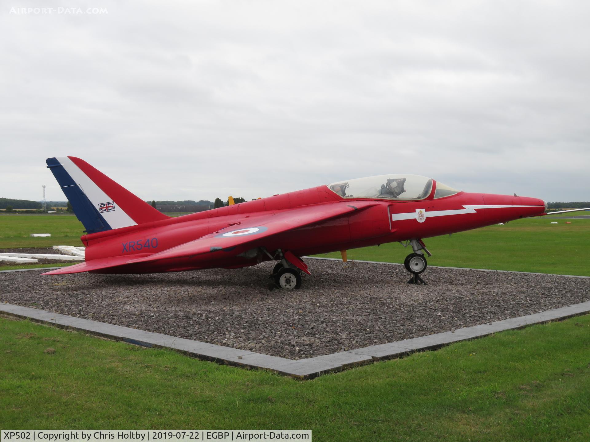 XP502, 1962 Folland Gnat T.1 C/N FL517, On static display opposite the car park at 'Cotswold International Airport'