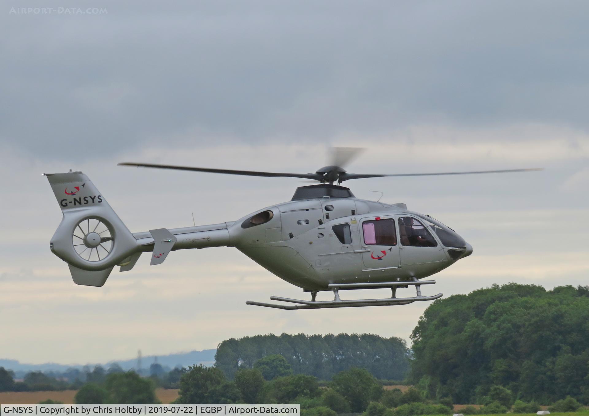 G-NSYS, 1999 Eurocopter EC-135T-1 C/N 0115, Lifting off at Kemble Airfield