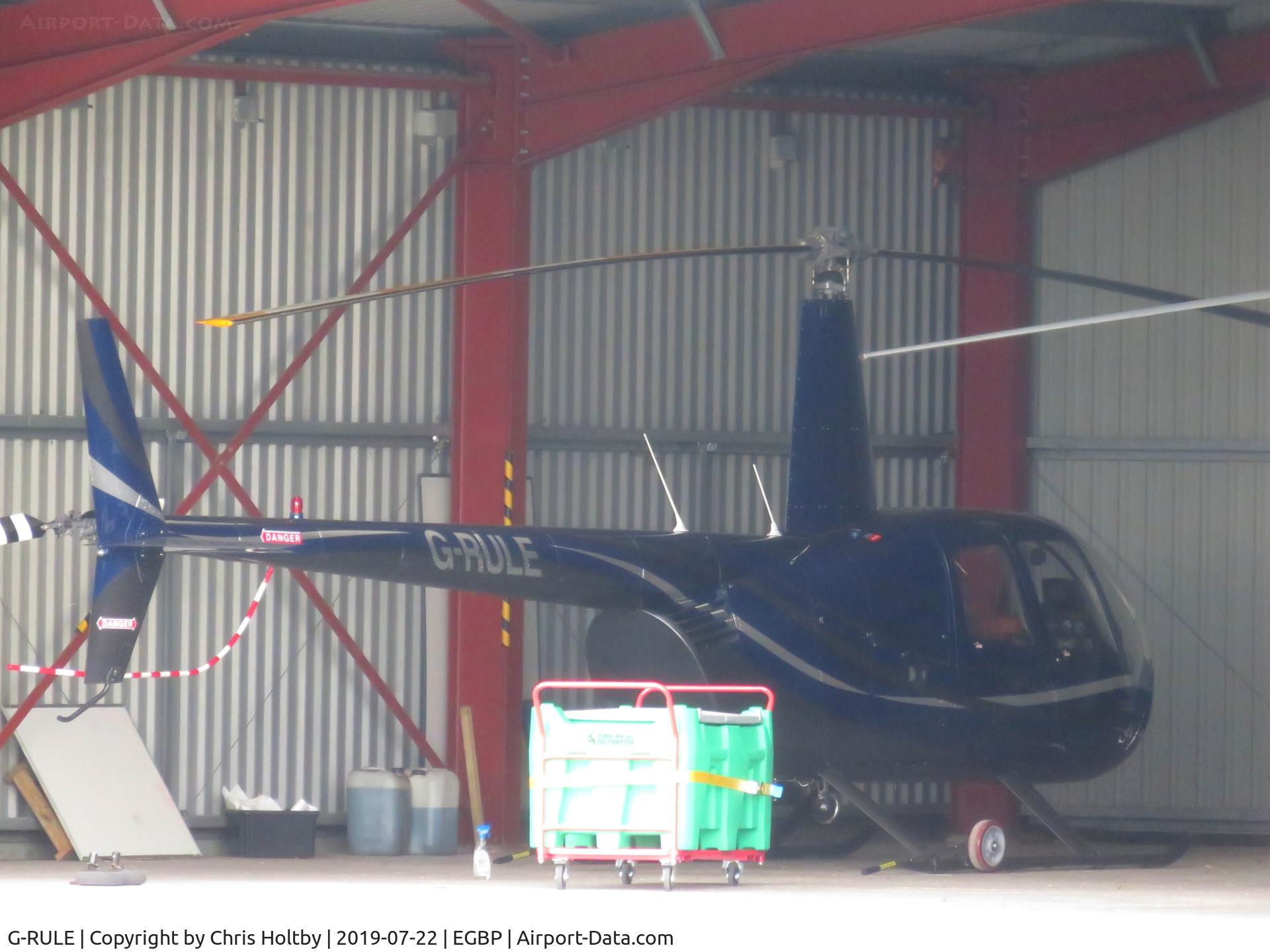 G-RULE, 2005 Robinson R44 Raven II C/N 11039, Raven II hangared at Kemble Airfield owned by Huckair, Bristol