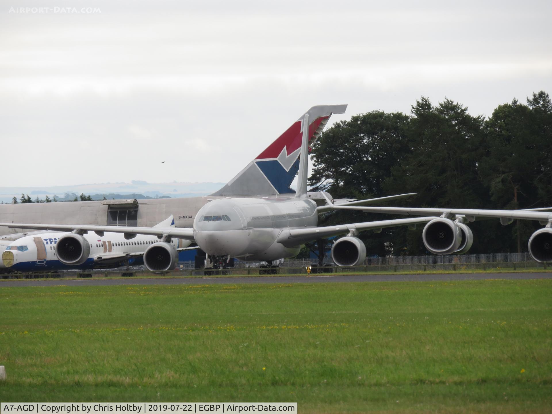 A7-AGD, 2007 Airbus A340-642X C/N 798, ex-Qatar Airways A340 Airbus at Kemble for scrapping for parts since May 2019. All its livery insignia now removed and it is re-registered as 2-AGDD