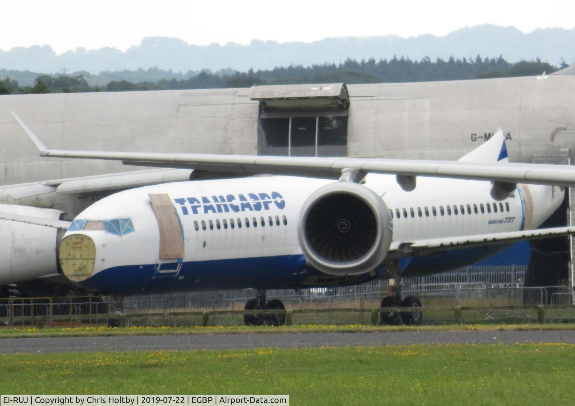 EI-RUJ, 1999 Boeing 737-81Q C/N 29049, Not much left of the Transaero 737 being stripped for parts at Kemble.