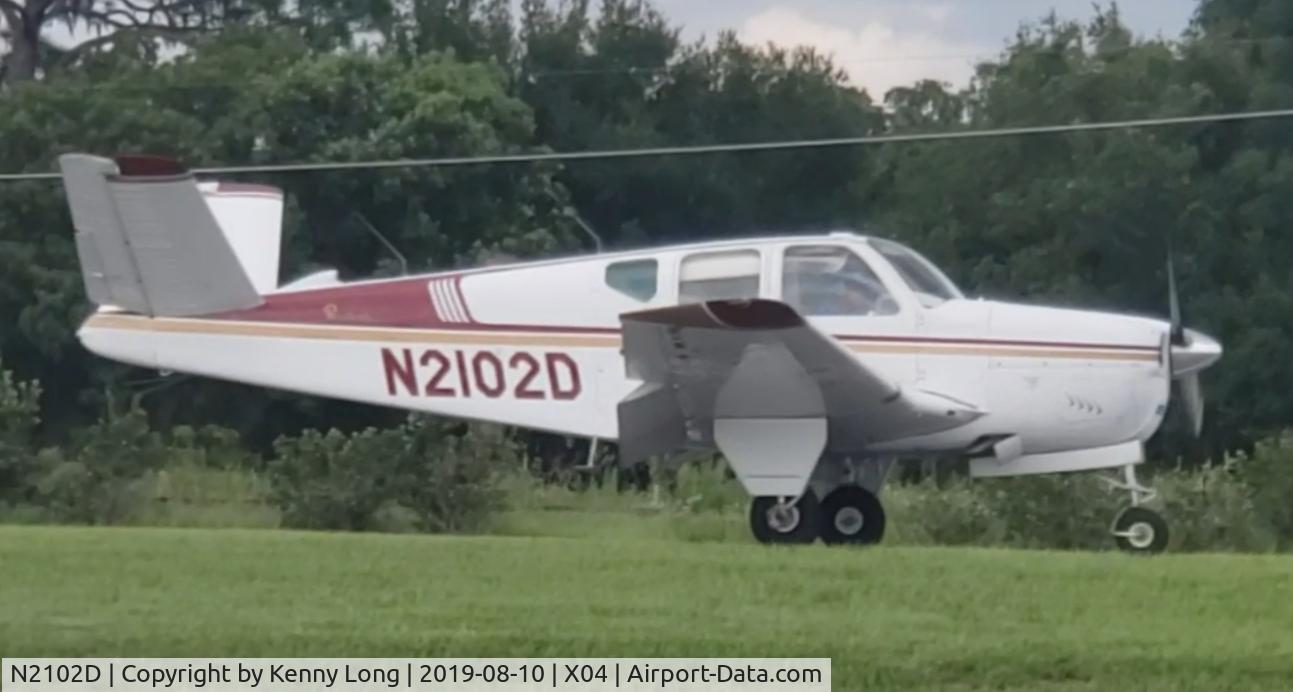 N2102D, 1953 Beech D35 C/N D-3447, 1953 Bonanza V-Tail  White with red and gold stripes.