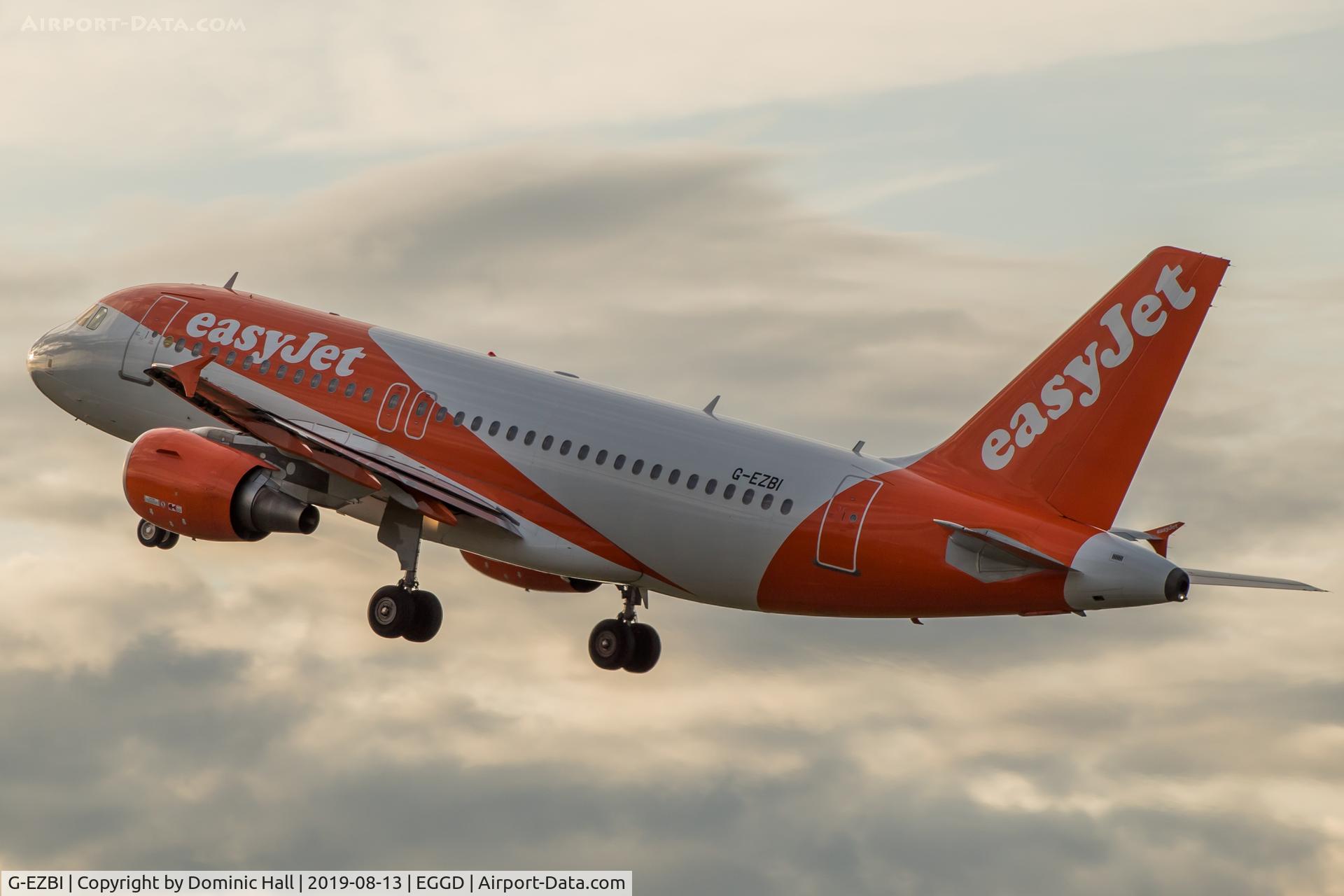 G-EZBI, 2006 Airbus A319-111 C/N 3003, Departing RWY 27 into the setting sun