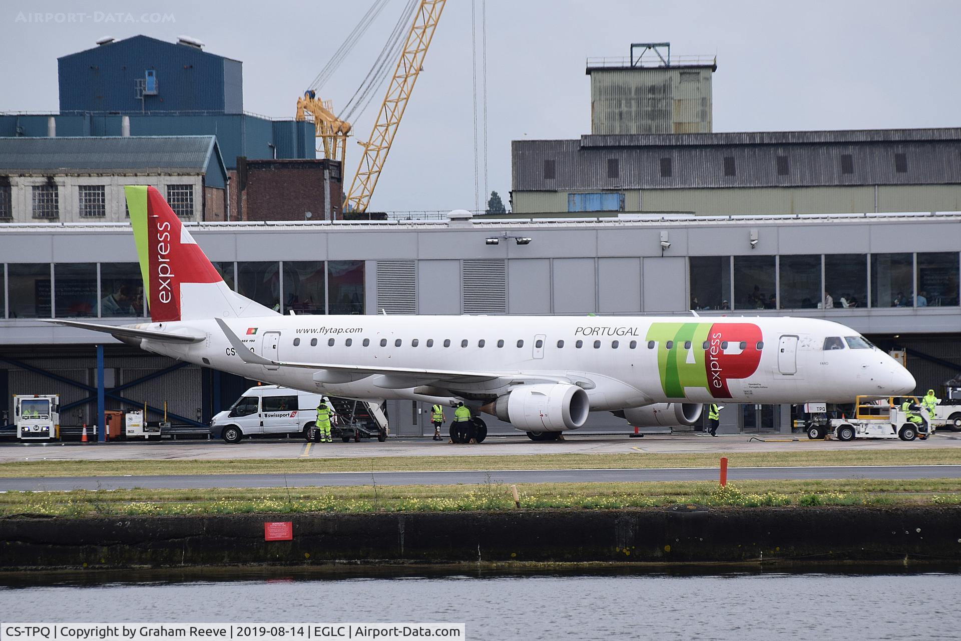 CS-TPQ, 2011 Embraer 190LR (ERJ-190-100LR) C/N 19000450, On stand at London City.