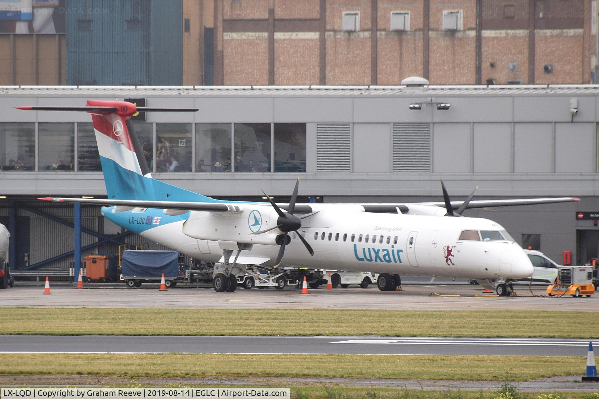 LX-LQD, 2016 De Havilland Canada DHC-8-402Q Dash 8 Dash 8 C/N 4525, On stand at London City.