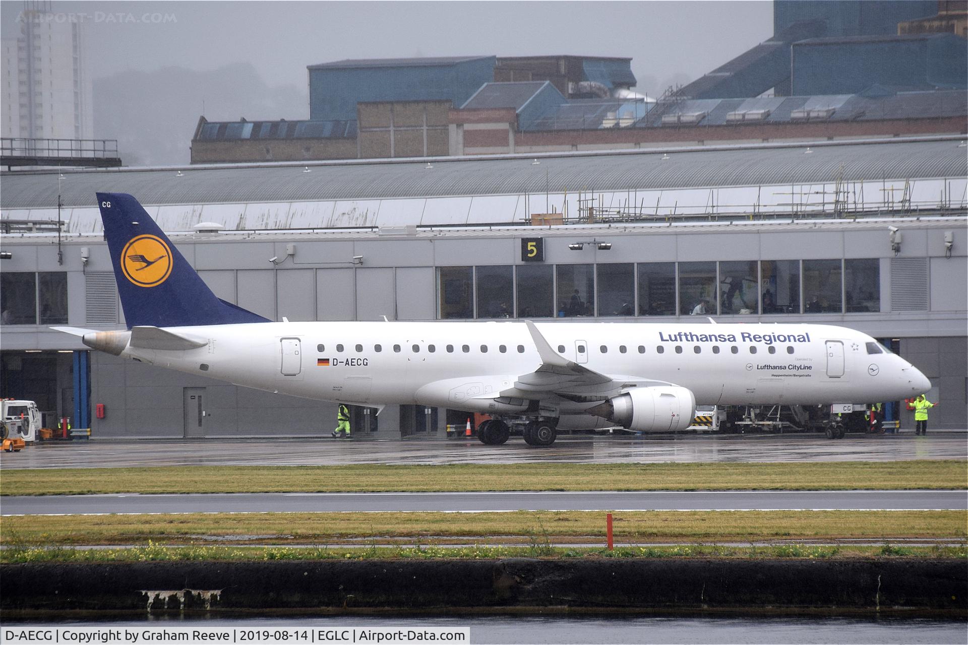 D-AECG, 2010 Embraer 190LR (ERJ-190-100LR) C/N 19000368, Just landed at a very wet London City.