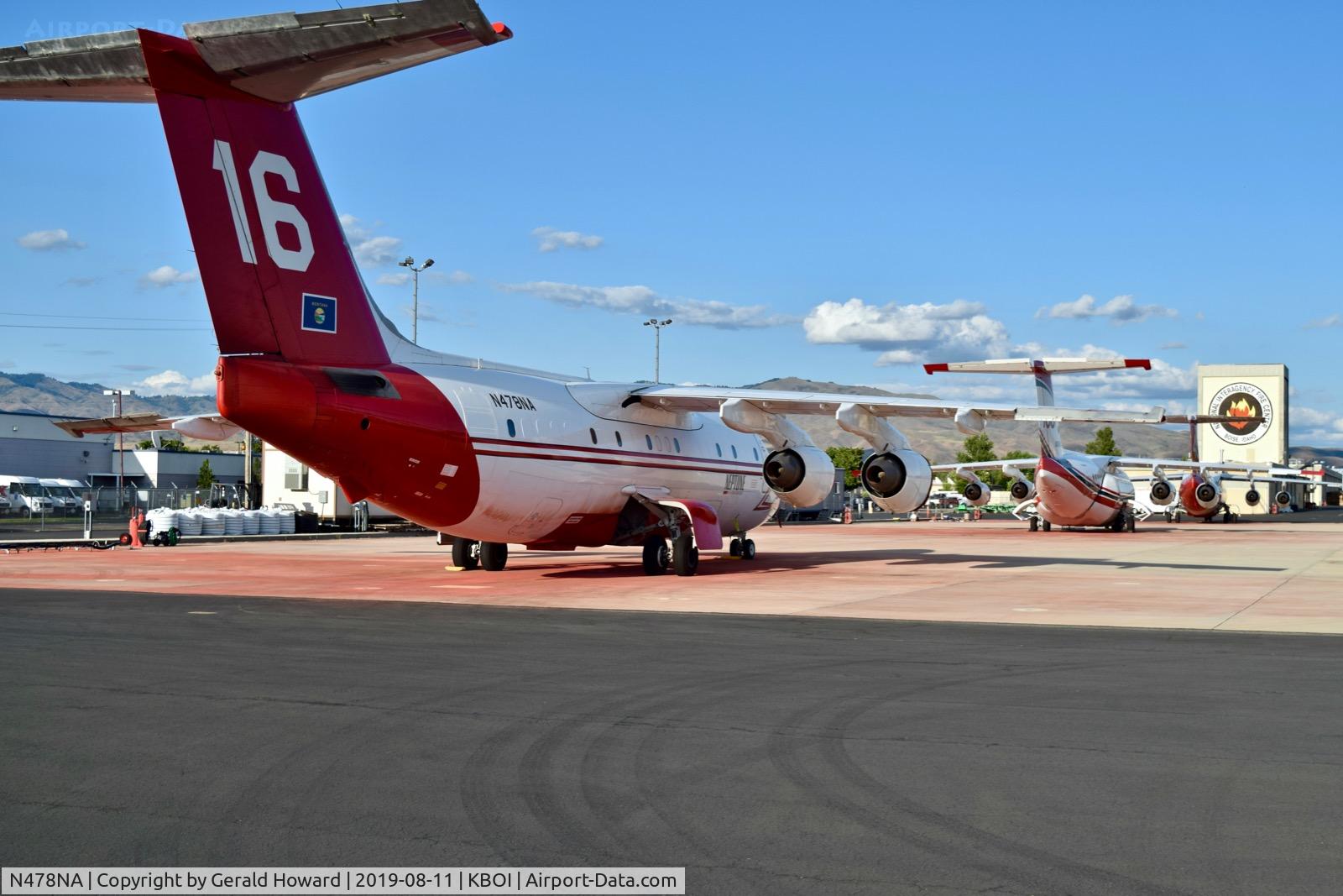 N478NA, 1986 British Aerospace BAe.146-200A C/N E2074, Three water tankers parked on the NIFC ramp.