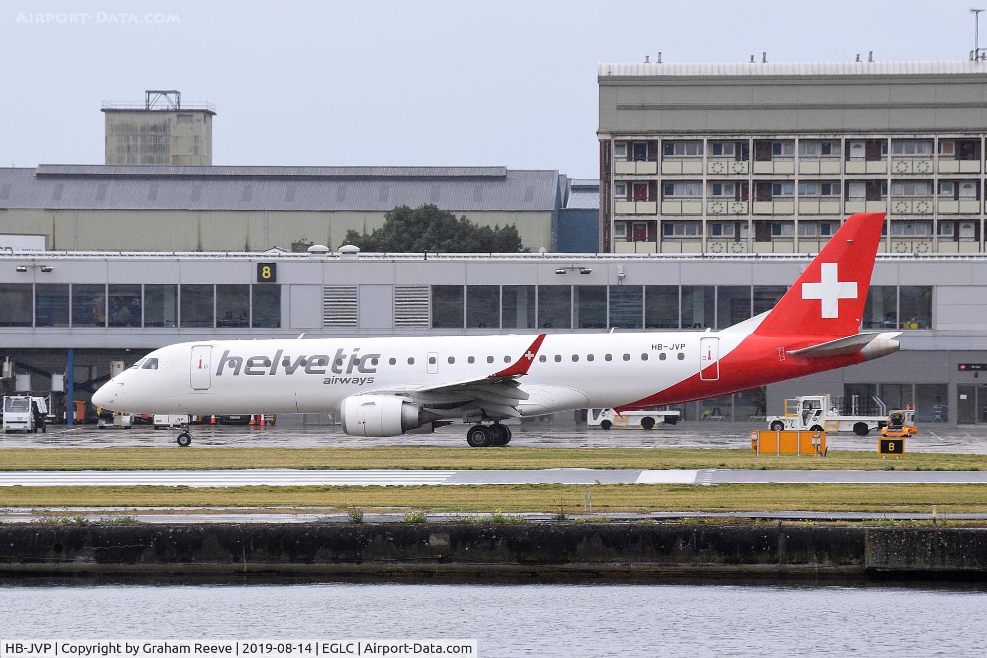 HB-JVP, 2010 Embraer 190LR (ERJ-190-100LR) C/N 19000387, Just landed at a very wet London City.