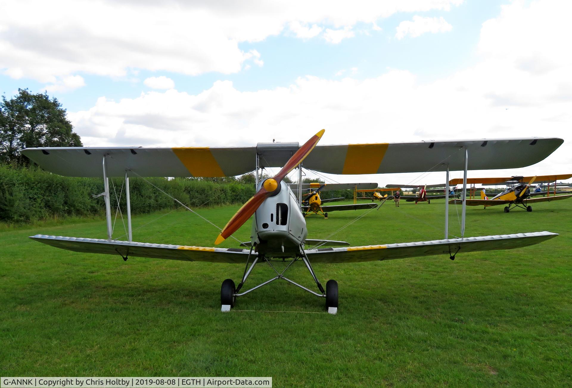 G-ANNK, 1940 De Havilland DH-82A Tiger Moth II C/N 83804, Head-on view showing the beautiful wooden prop of this 1940 Tiger Moth in RAF livery at the 'Gathering of Moths' day 2019 at Old Warden