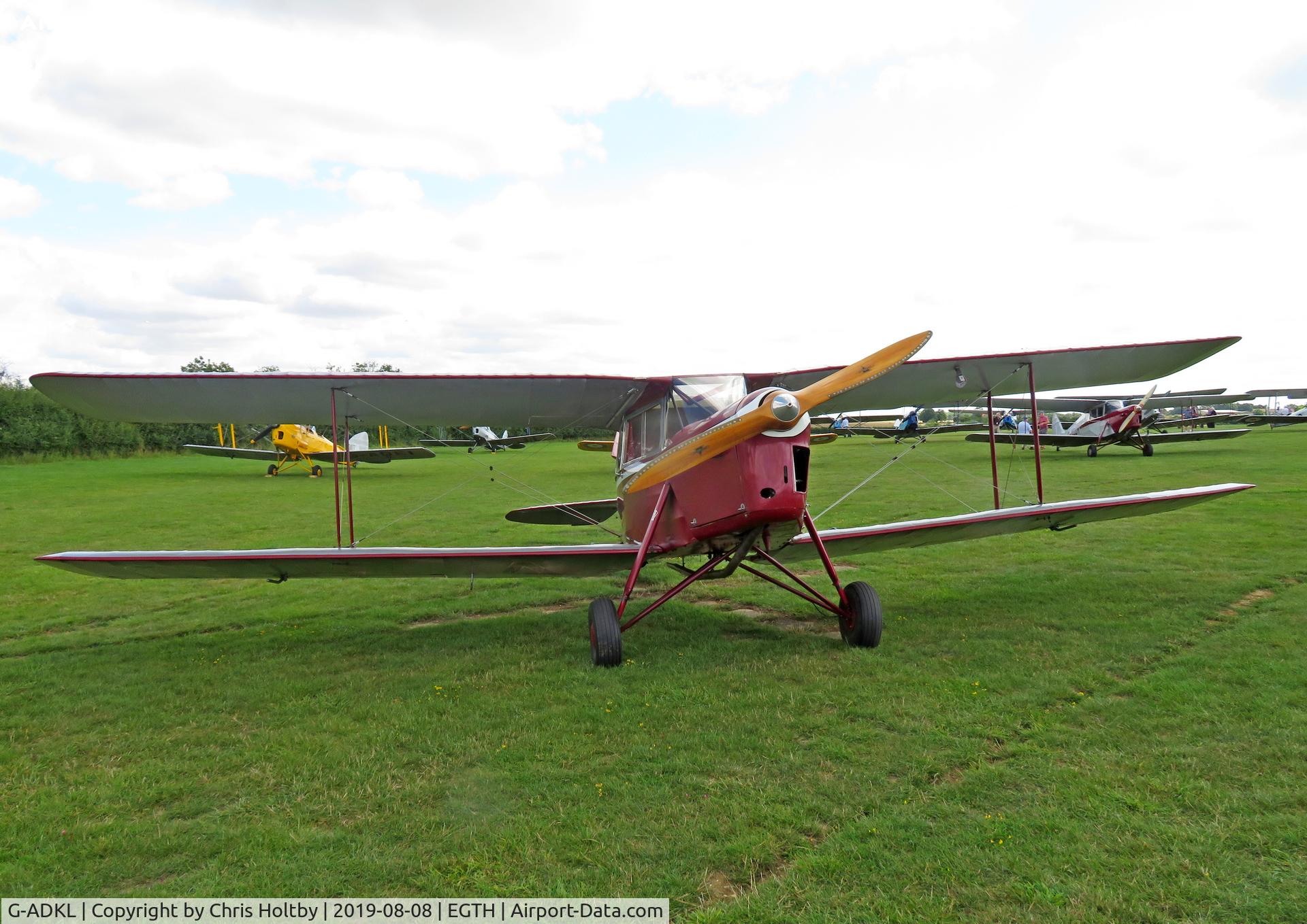 G-ADKL, 1935 De Havilland DH.87B Hornet Moth C/N 8035, The 1935 Hornet Moth head-on showing beautiful wooden prop at the 'Gathering of Moths' Day 2019 at Old Warden