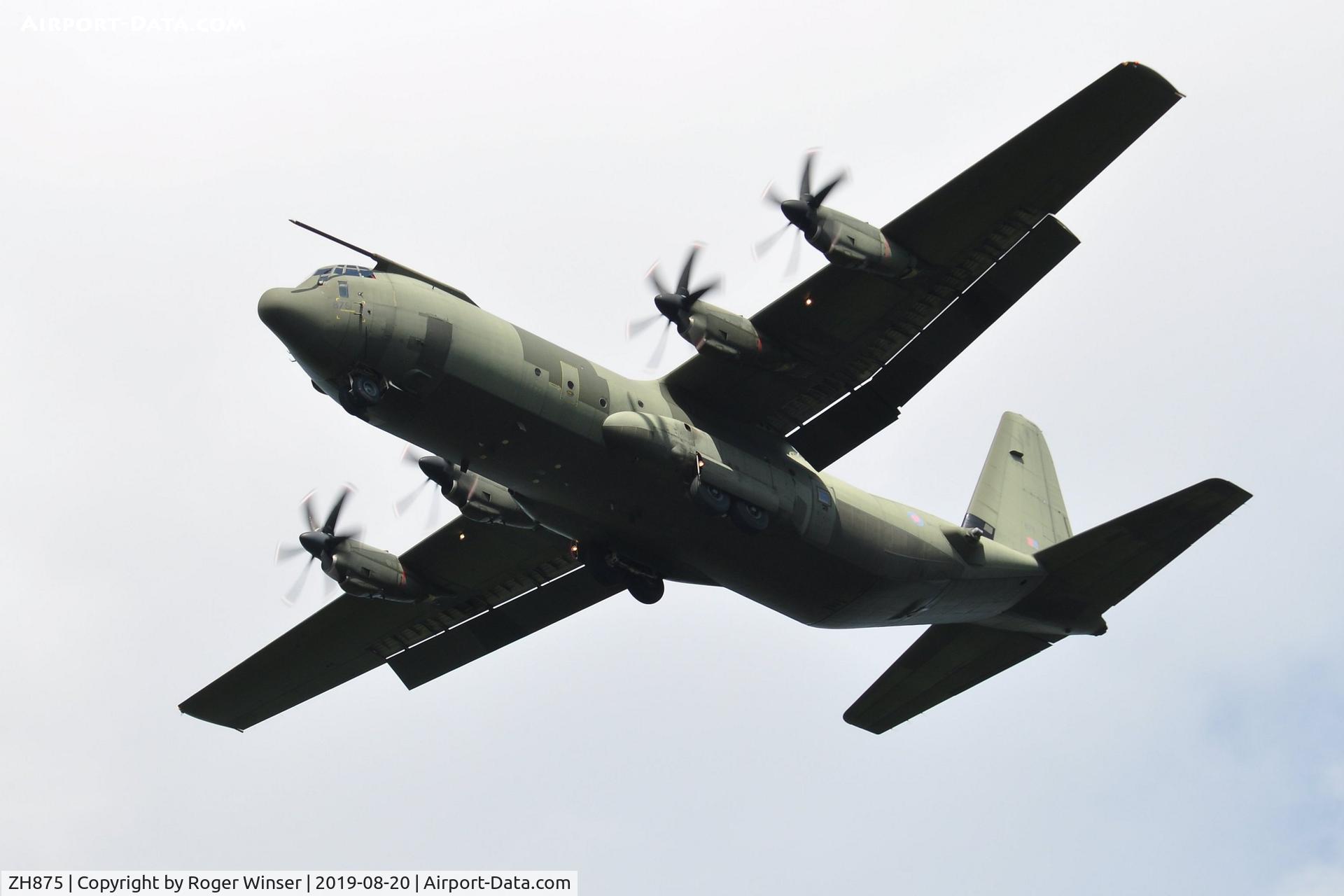 ZH875, 1998 Lockheed Martin C-130J-30 Super Hercules C4 C/N 382-5459, Off airport. RAF Hercules C.4 aircraft coded 875 on a practice approach to Runway 22 at Swansea Airport, Wales, UK.