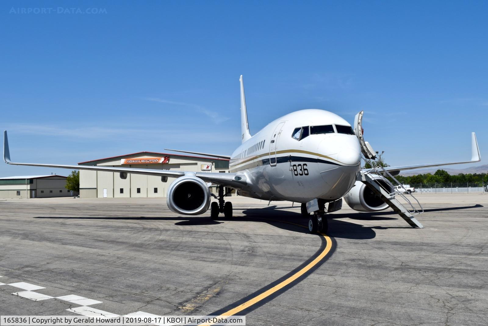 165836, 2004 Boeing C-40A Clipper C/N 33836, Navy transport parked on the west De ice pad.