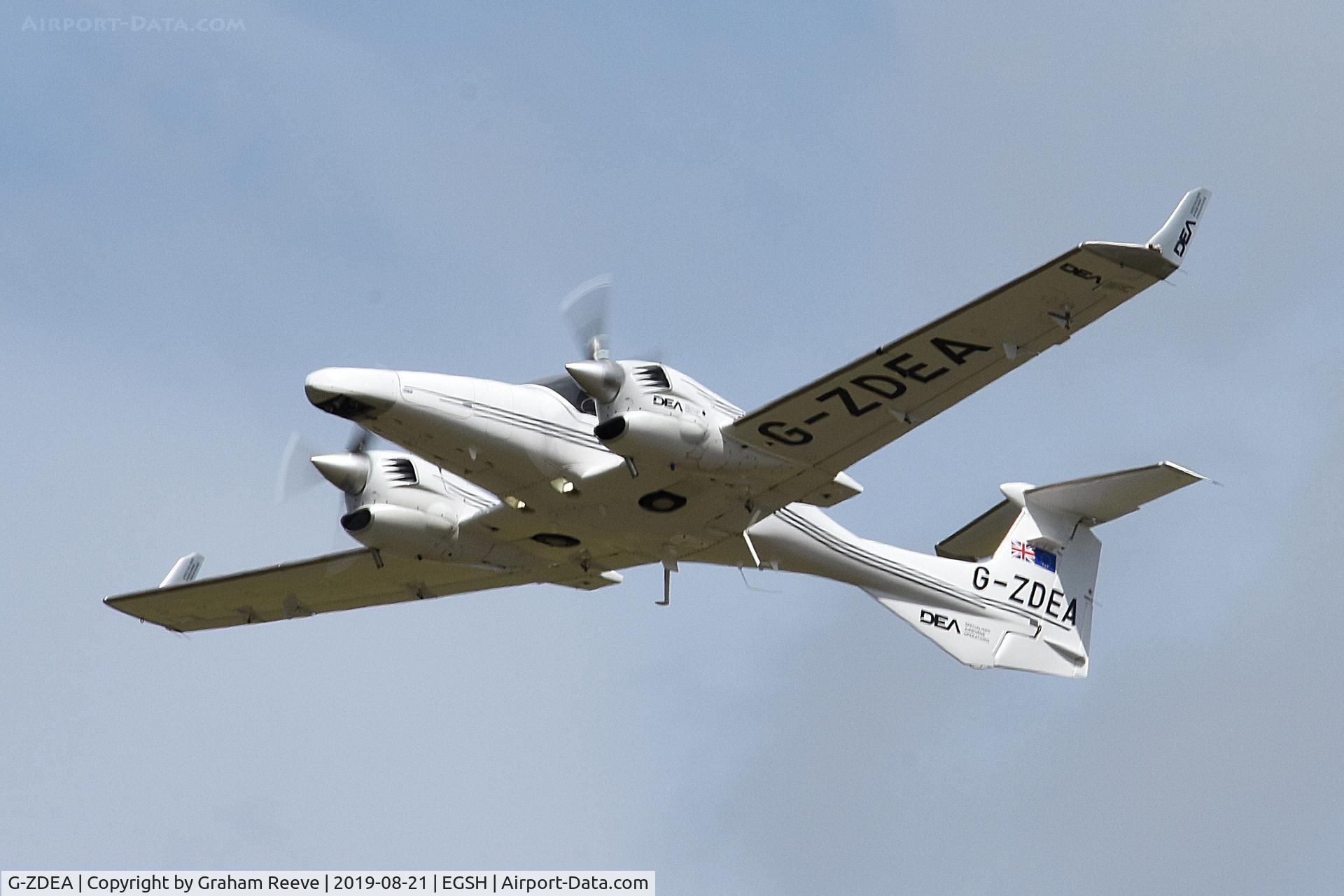 G-ZDEA, 2006 Diamond DA-42 Twin Star C/N 42 080, Departing from Norwich.