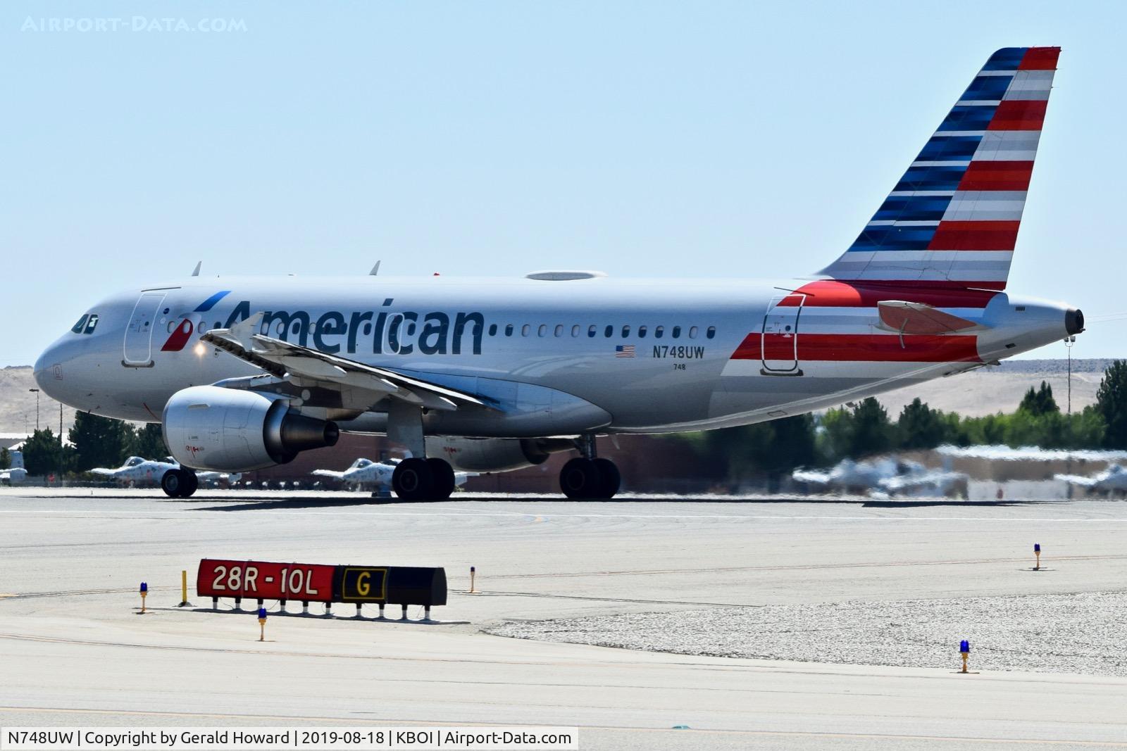 N748UW, 2000 Airbus A319-112 C/N 1311, Take off run on RWY 10L.