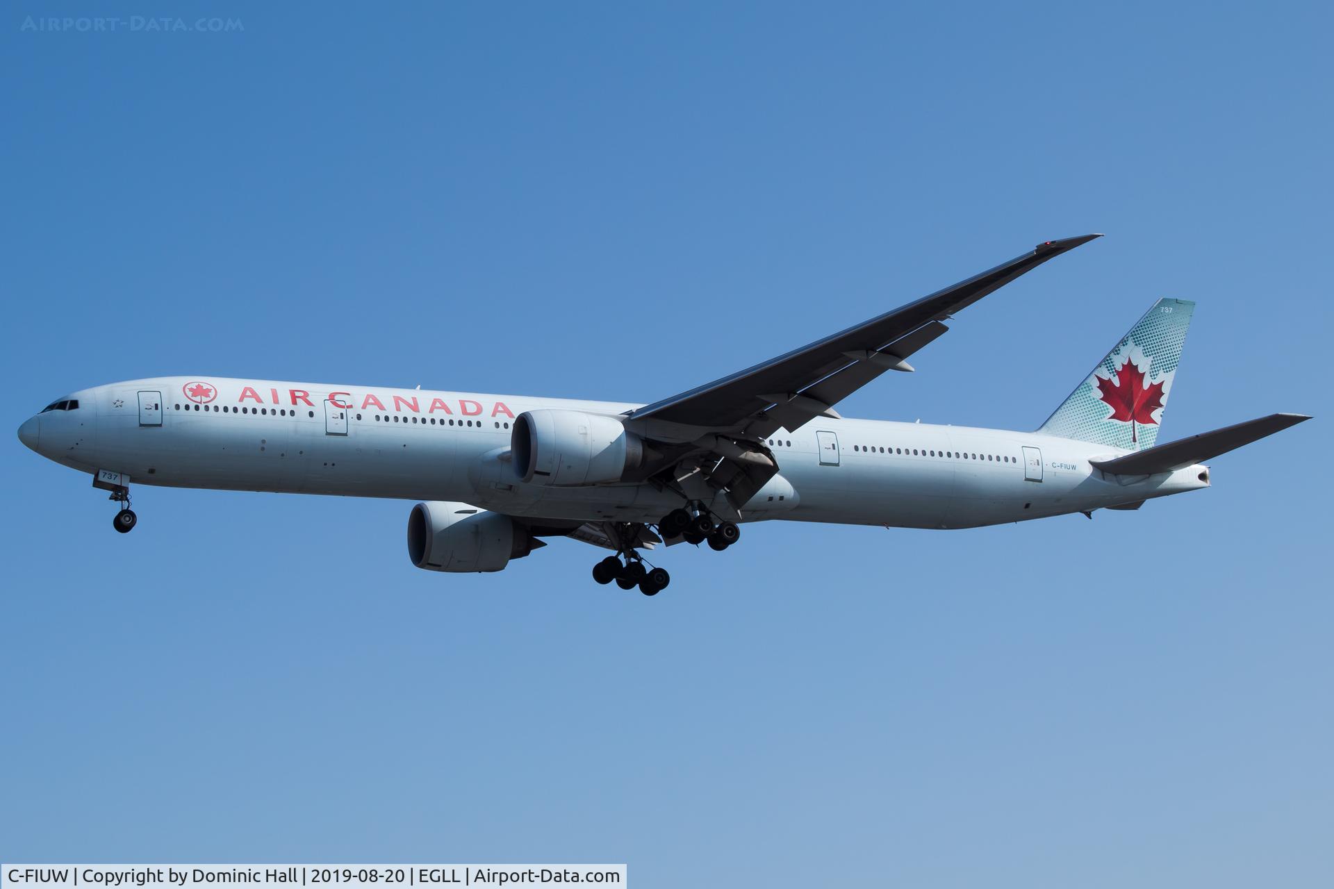 C-FIUW, 2008 Boeing 777-333/ER C/N 35249, Landing RWY 27R