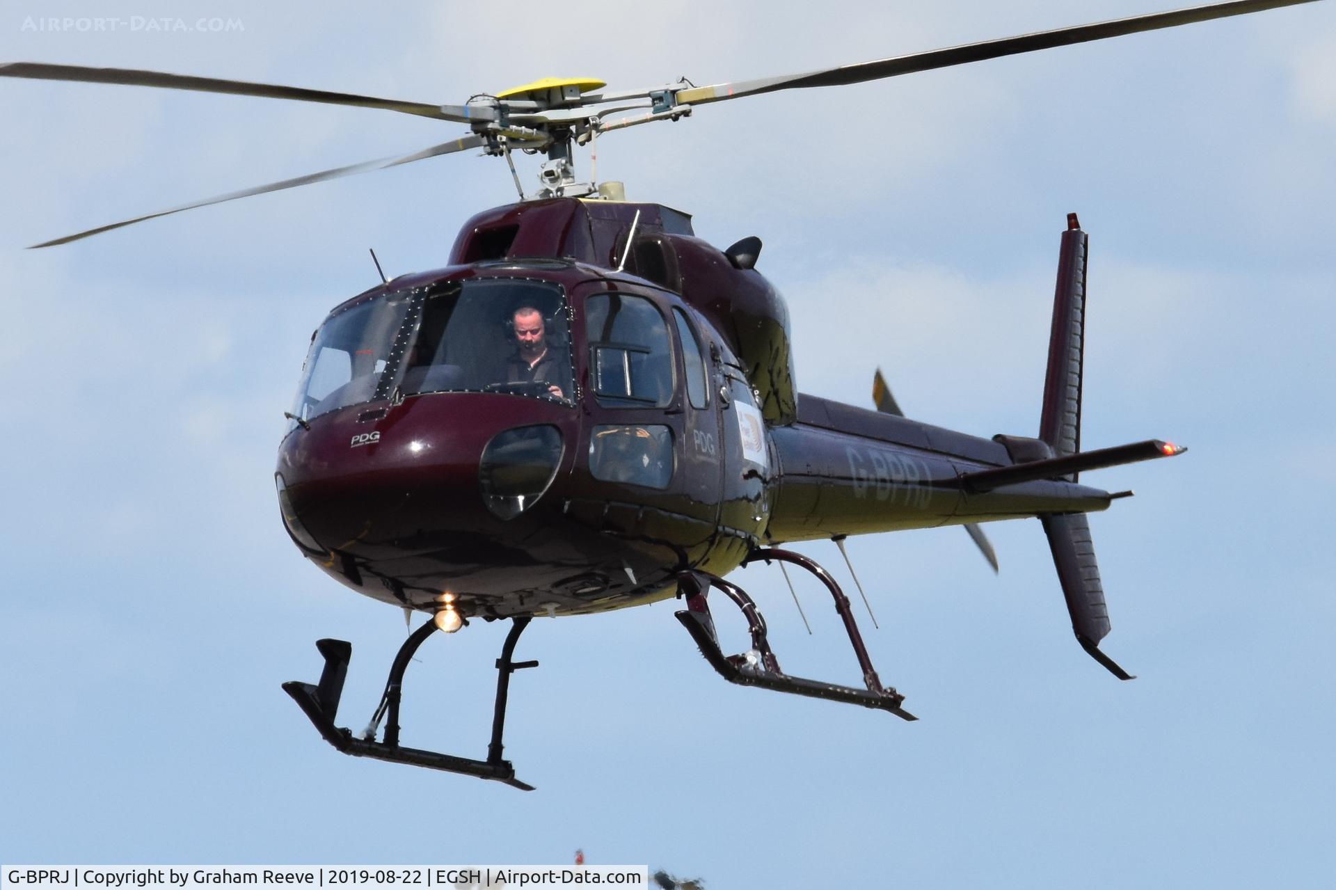G-BPRJ, 1982 Aerospatiale AS-355F-1 Ecureuil 2 C/N 5201, Landing at Norwich.