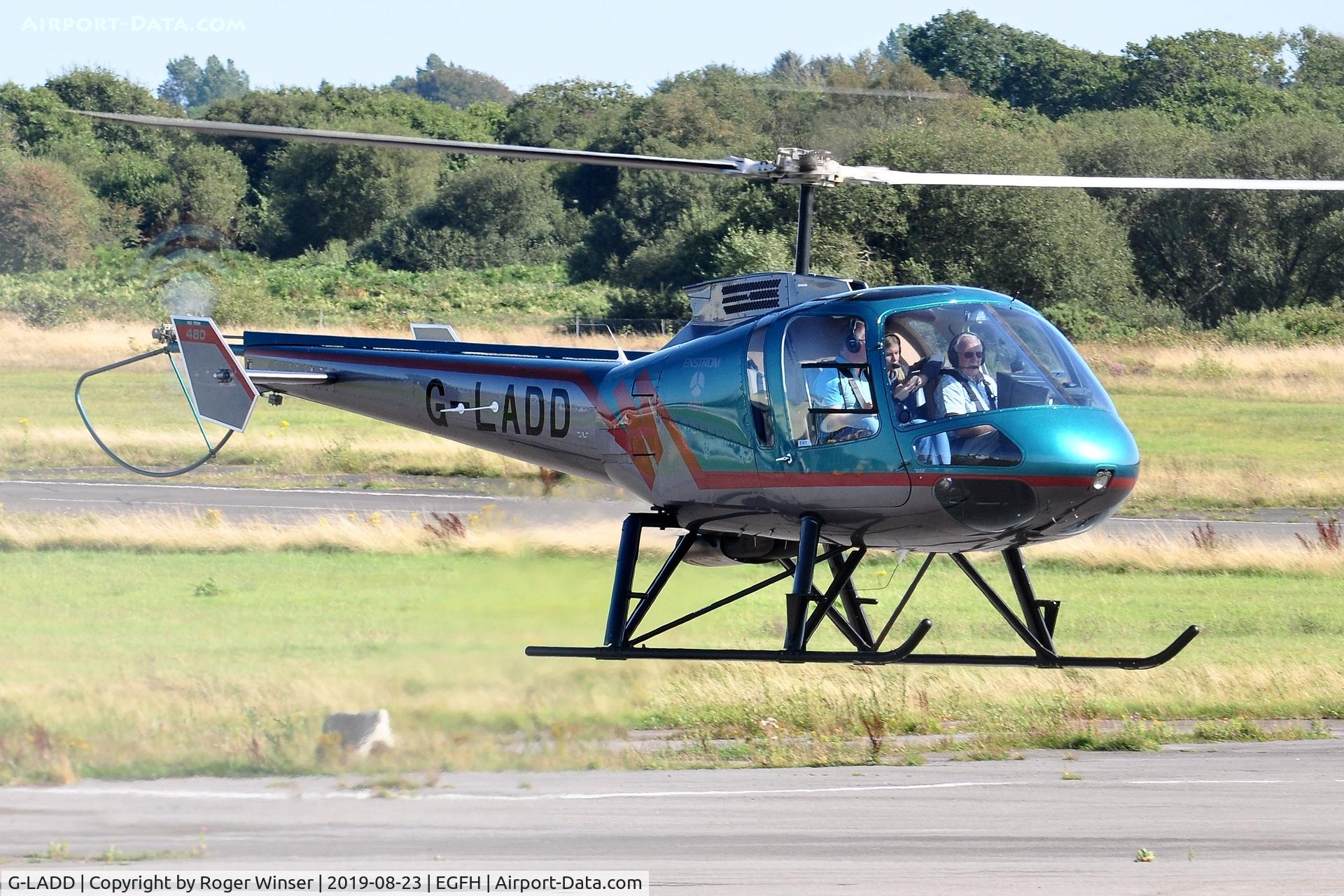 G-LADD, 1999 Enstrom 480 C/N 5037, Visiting Enstrom 480 departing.