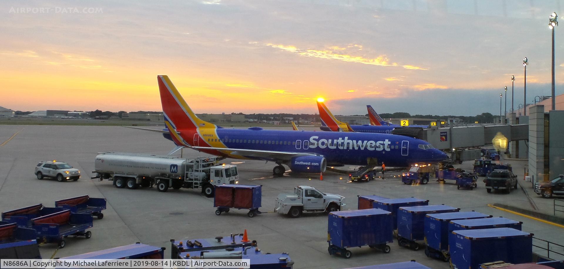 N8686A, 2016 Boeing 737-8H4 C/N 36938, Rising sun kissing the tail of Southwest in the early morning