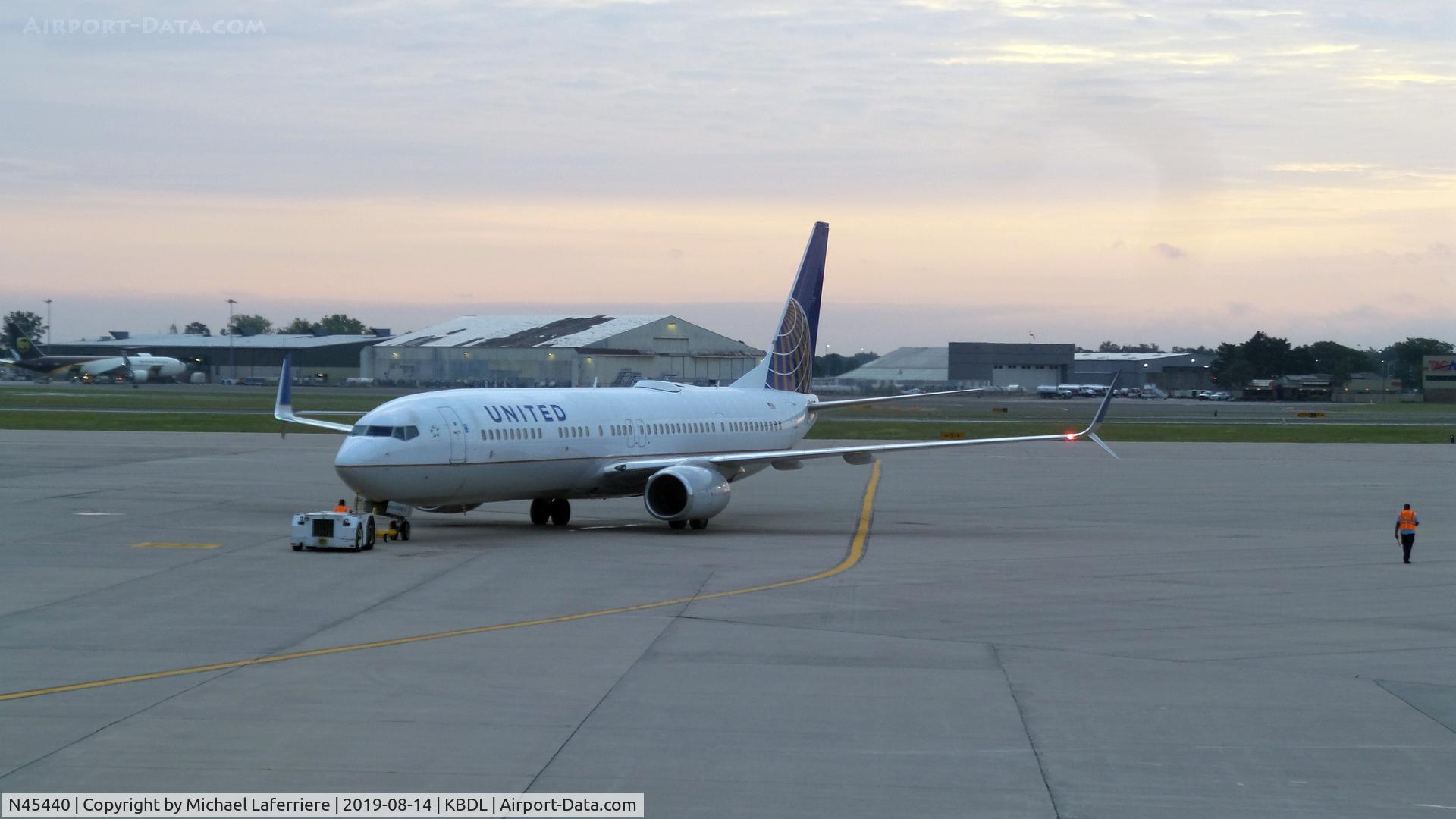 N45440, 2009 Boeing 737-924/ER C/N 33535, United 737 being backed for takeoff at Bradley Airport.