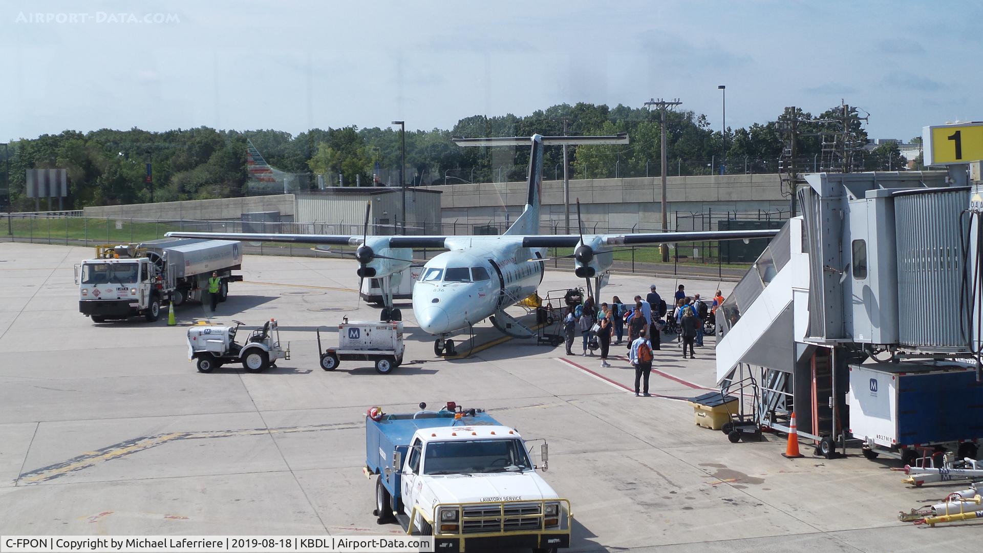 C-FPON, 1989 De Havilland Canada DHC-8-102 Dash 8 C/N 171, Air Canada, Dash 8 loading passengers at Bradley airport.