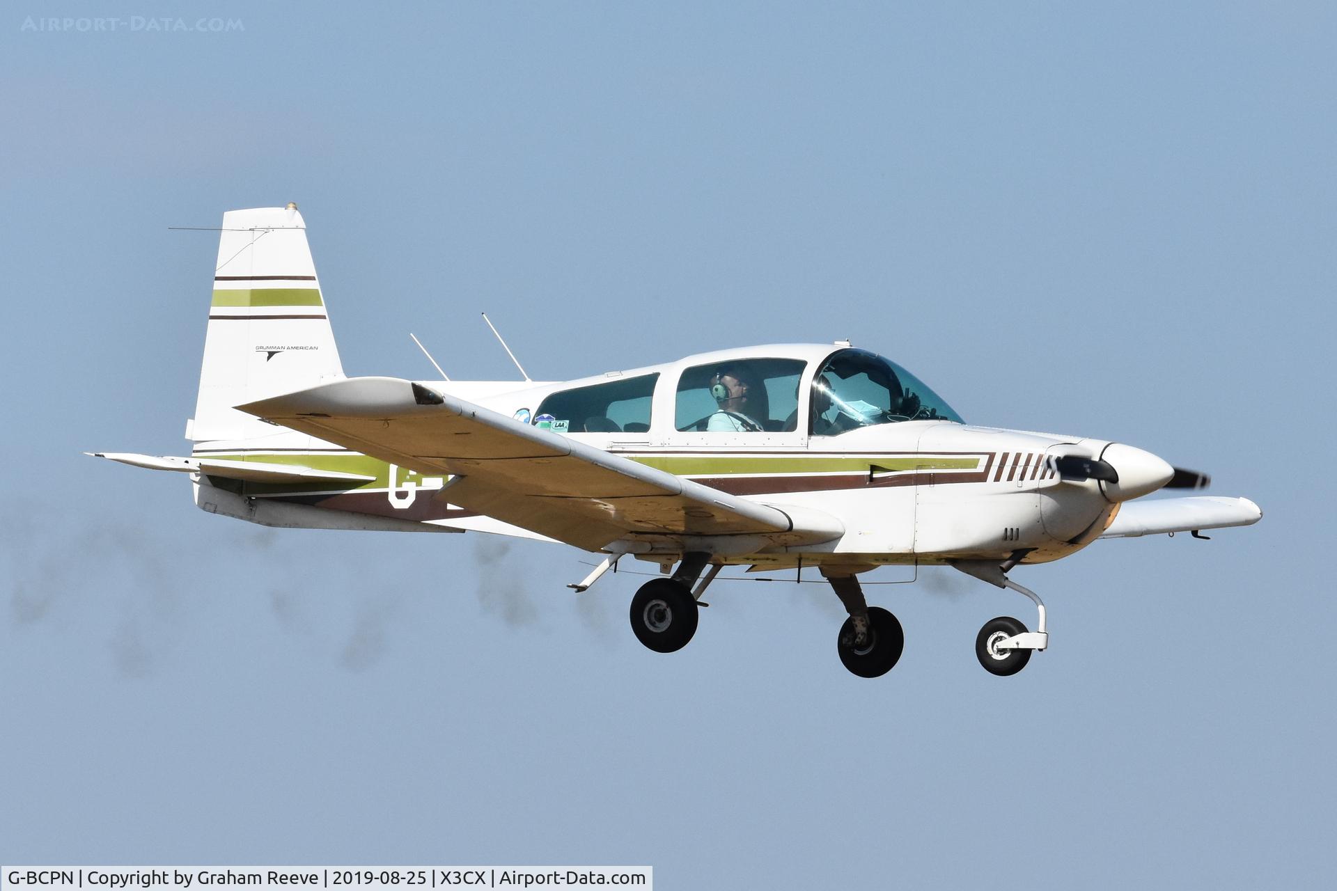 G-BCPN, 1974 Grumman American AA-5 Traveler C/N AA5-0665, Landing at Northrepps.