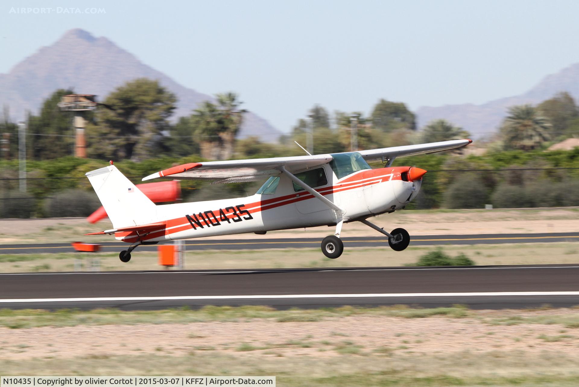 N10435, 1973 Cessna 150L C/N 15074859, landing at Mesa AZ