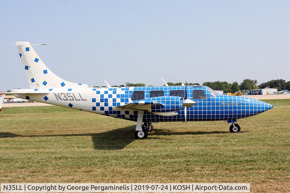 N35LL, 1976 Smith Aerostar 601P C/N 61P-0388-130, Departing from the GA camping area. Ted Smith designs always look like they're travelling at 500mph, even on the ground.