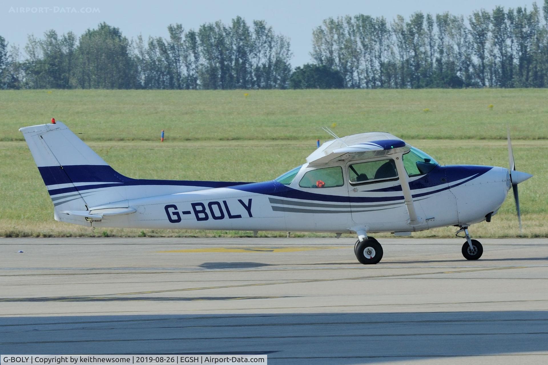 G-BOLY, 1977 Cessna 172N C/N 172-69004, Leaving Norwich.