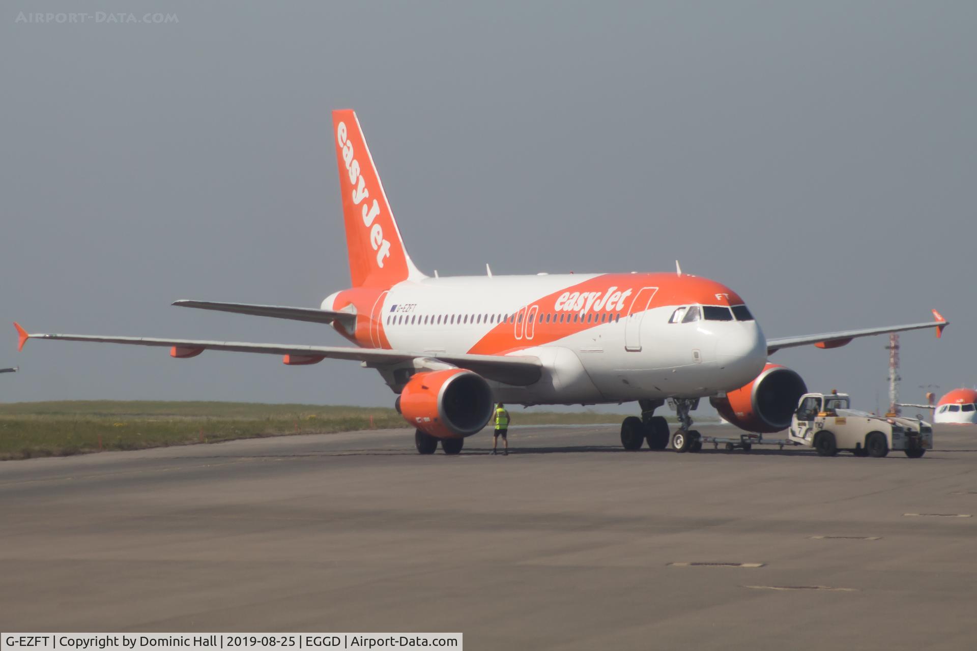 G-EZFT, 2009 Airbus A319-111 C/N 4132, On pushback from stand.