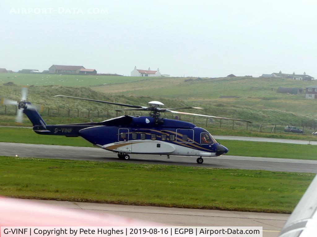 G-VINF, 2004 Sikorsky S-92A C/N 920008, G-VINF Sikorsky S92 seen from the window of G-LGNA on departure from Sumburgh, Shetland