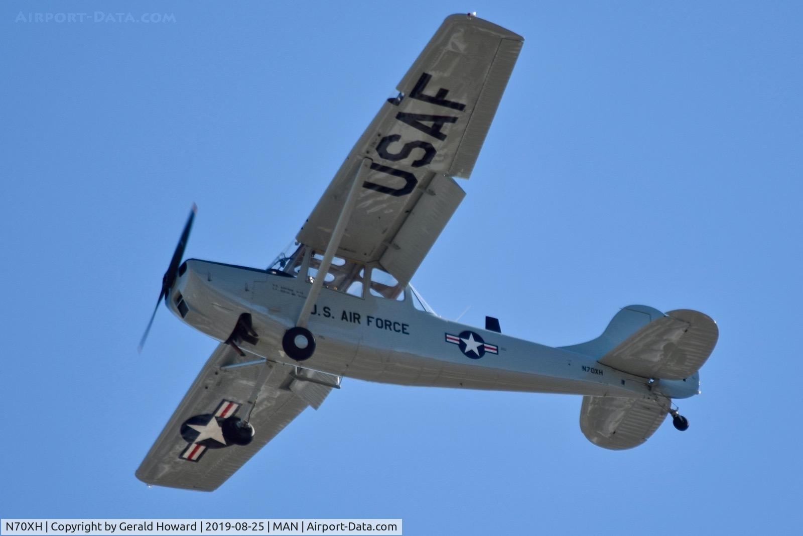 N70XH, Cessna 305A C/N 22048, Over flying the airport.