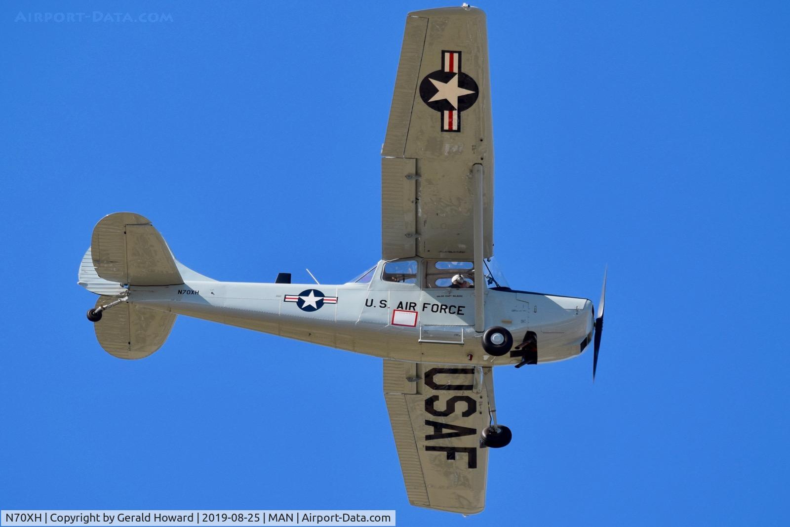 N70XH, Cessna 305A C/N 22048, Over flying the airport.
