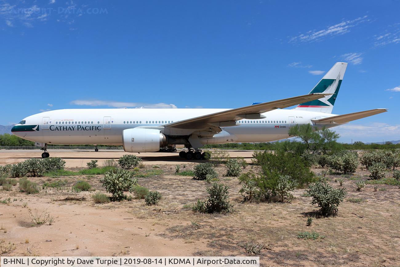 B-HNL, 1994 Boeing 777-267 C/N 27116, Located at Pima Air & Space Museum, adjacent to KDMA. 12 June 1994: At 11:45 a.m., Boeing test pilots John Cashman and Kenny Higgins took the first Boeing 777-200 airliner, line number WA001, registration N7771, on its first flight. This is that plane.