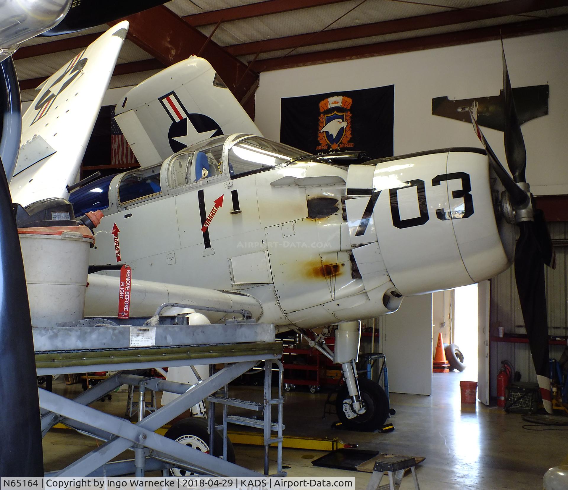 N65164, 1955 Douglas EA-1E Skyraider AD-5W C/N 55-471DH, Douglas AD-5W (EA-1E) Skyraider in the maintenance hangar at the Cavanaugh Flight Museum, Addison TX