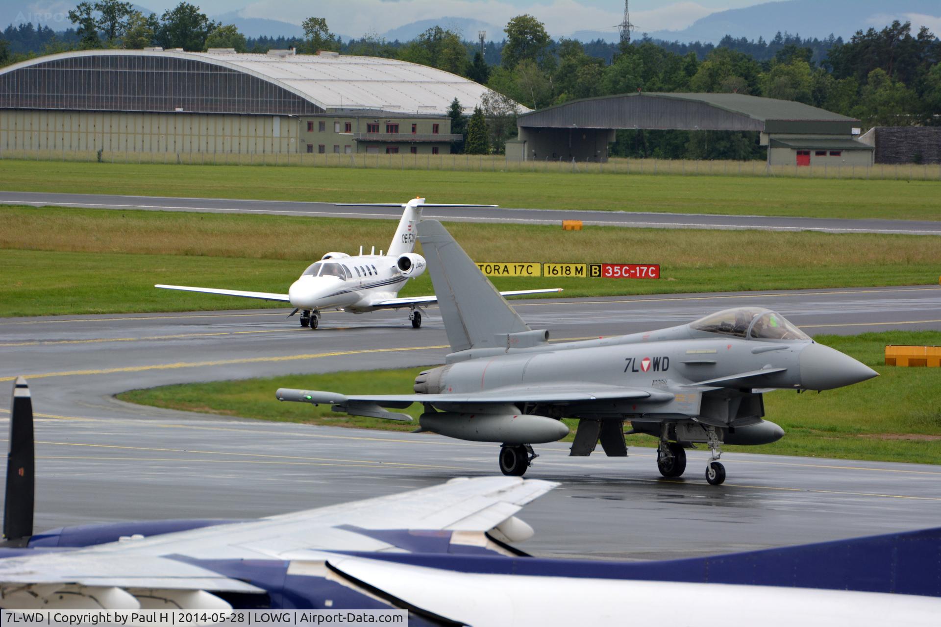 7L-WD, 2007 Eurofighter EF-2000 Typhoon S C/N AS004, OE-FCW (Cessna 525) with an Eurofighter of the Austrian AF at LOWG