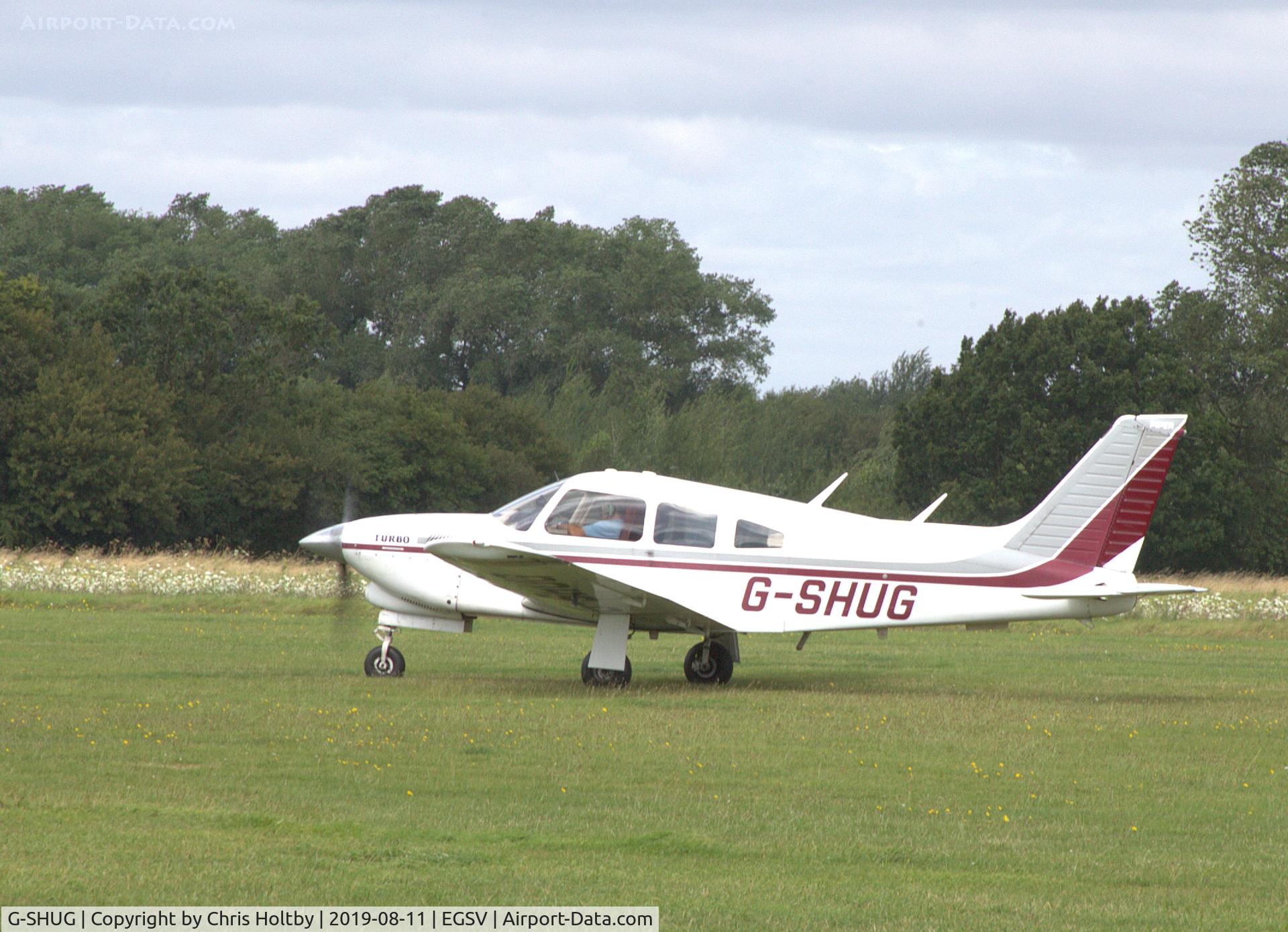 G-SHUG, 1977 Piper PA-28R-201T Cherokee Arrow III C/N 28R-7703048, Taxiing at Old Buckenham