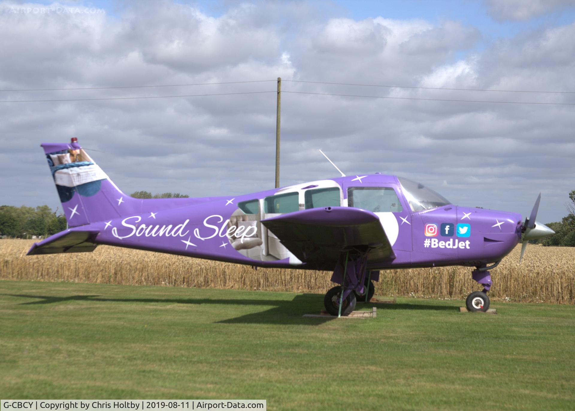 G-CBCY, 1977 Beech C24R Sierra Super C/N MC-491, Being used as a static advertisement for bed company at Winfarthing industrial estate Norfolk