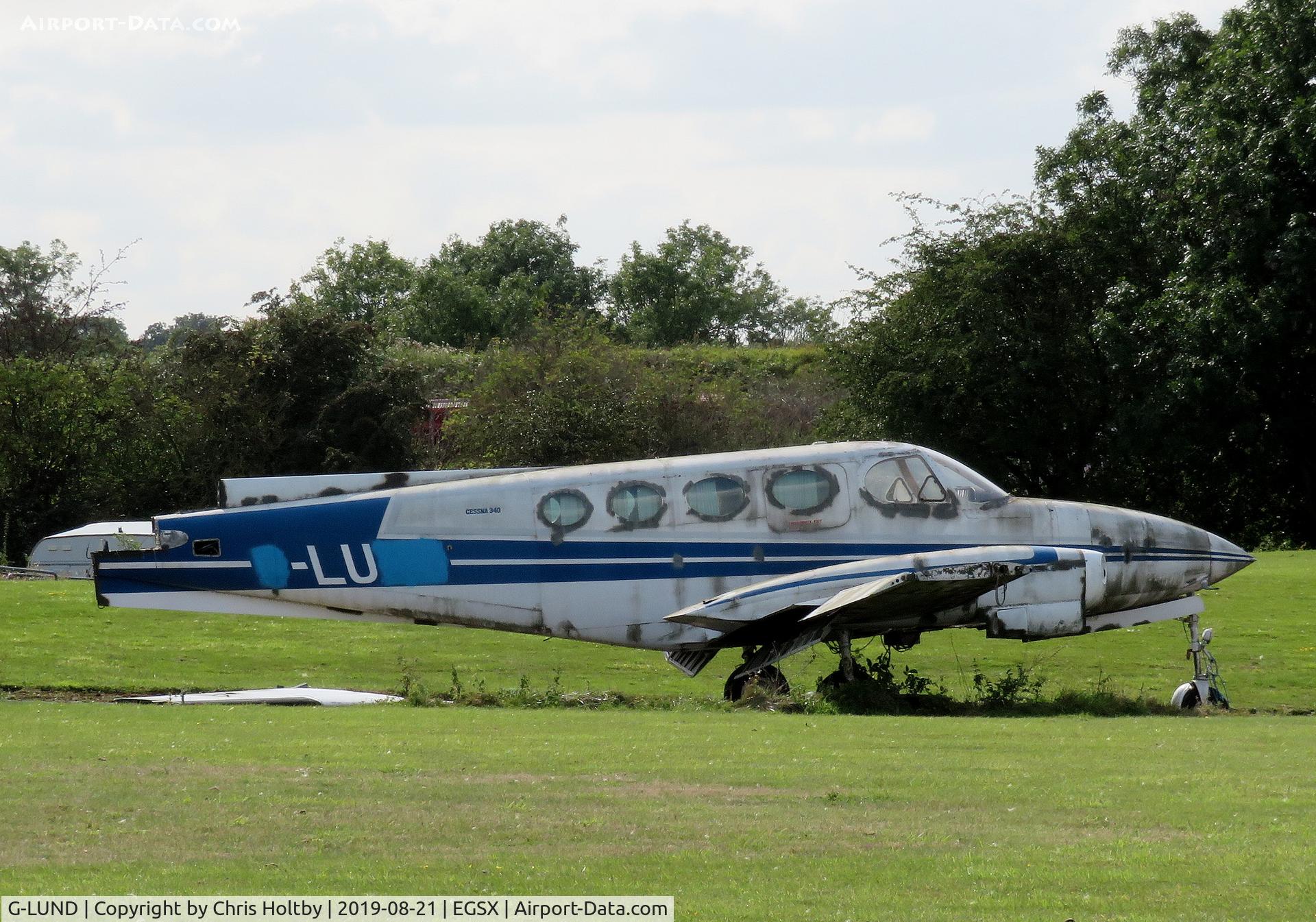 G-LUND, 1973 Cessna 340 C/N 340-0305, Cessna 340 in the graveyard at North Weald - not much left of her