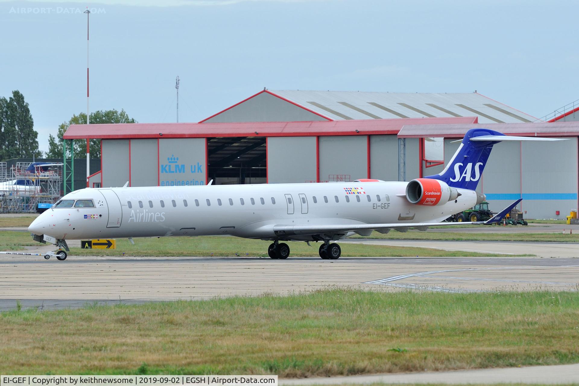 EI-GEF, 2009 Bombardier CRJ-900 (CL-600-2D24) C/N 15244, Towed from paint shop with refreshed paintwork.